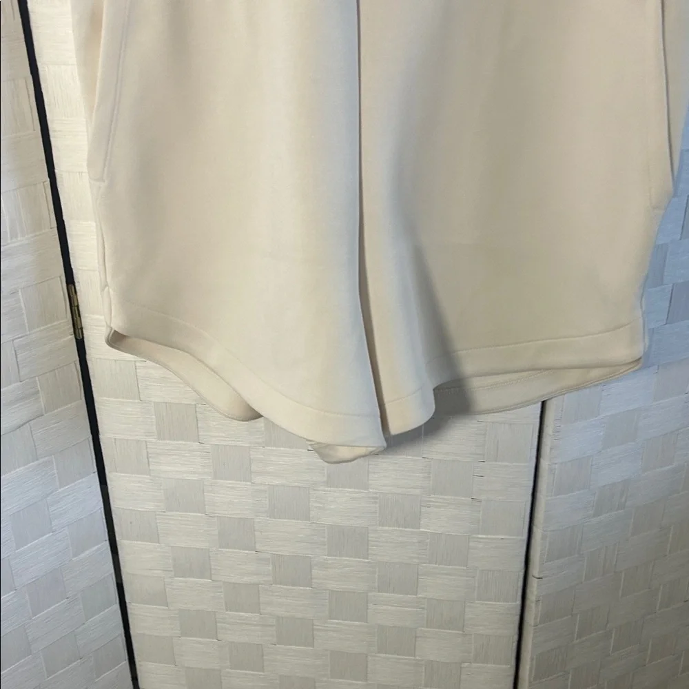 A New Day Sleeveless Cream Jumpsuit with pockets - Picture 4 of 7